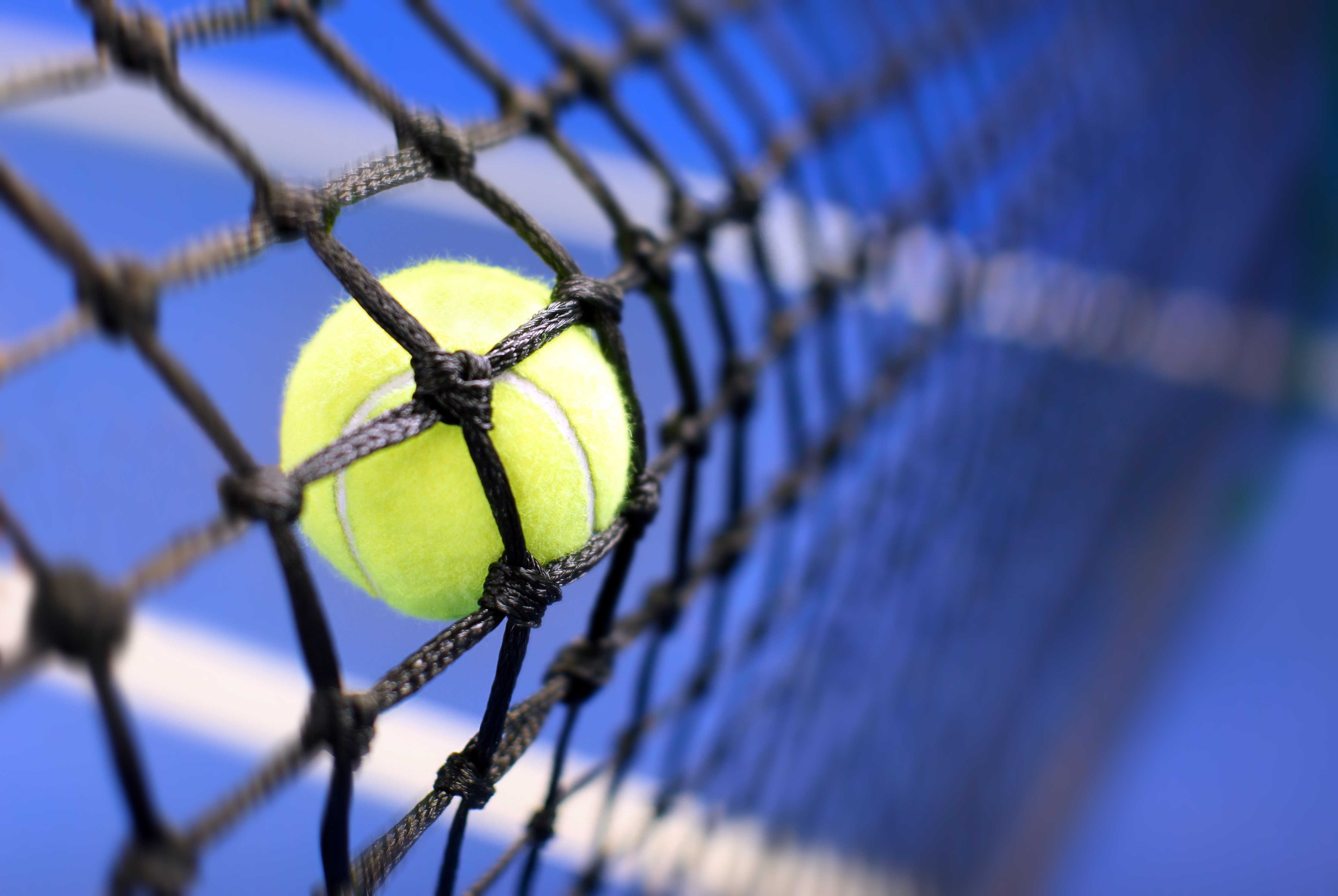 tennis ball on a tennis court - VistaProduction
